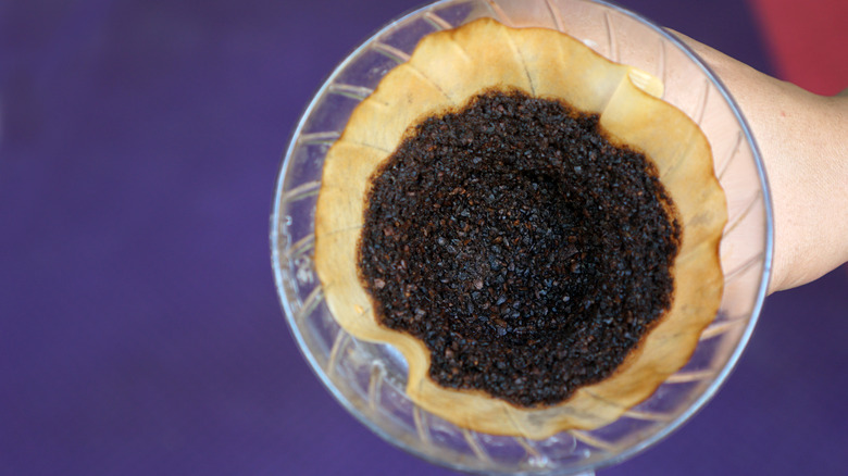 coffee grinds in a glass cup