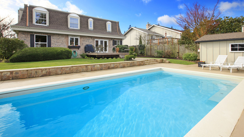 pool with concrete patio