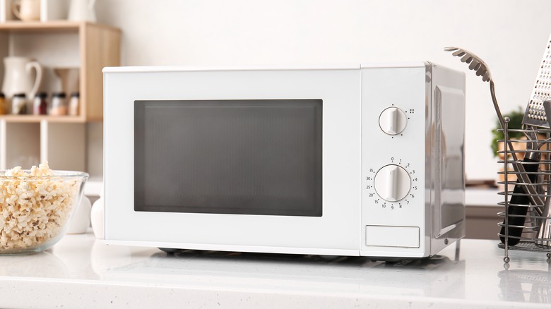 White microwave on kitchen counter