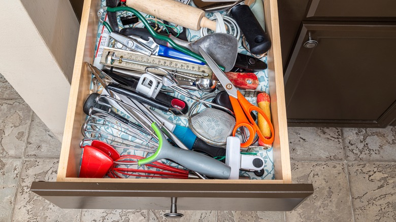 cluttered kitchen junk drawer