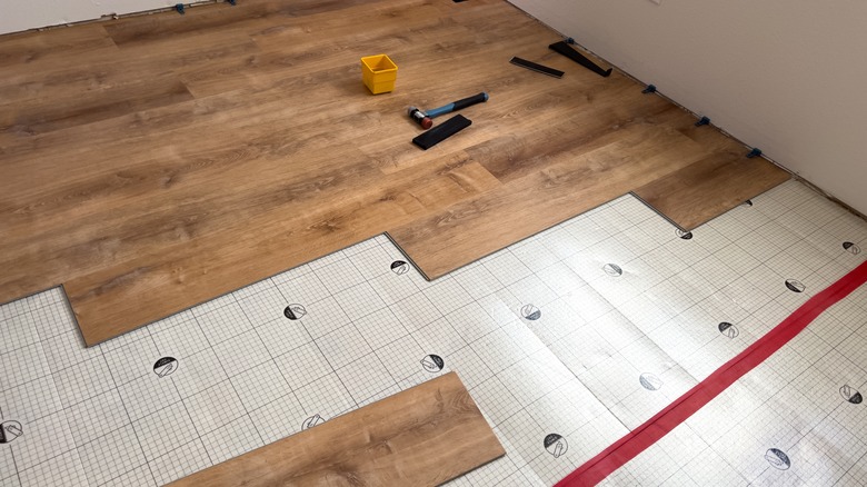 Installing floating vinyl plank flooring over underlayment