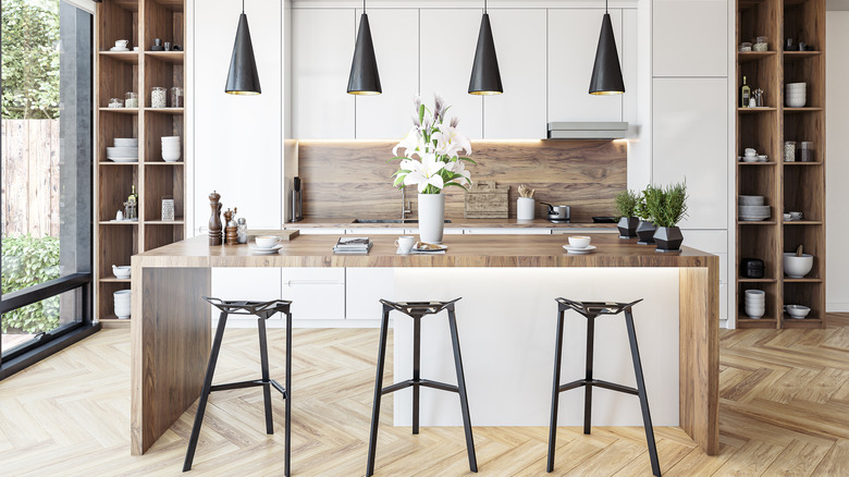 pendant lights overtop modern rustic kitchen