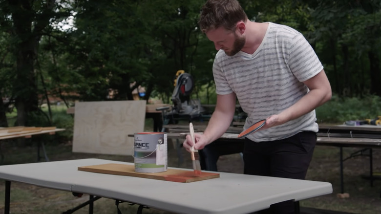 Bobby Berk painting wood