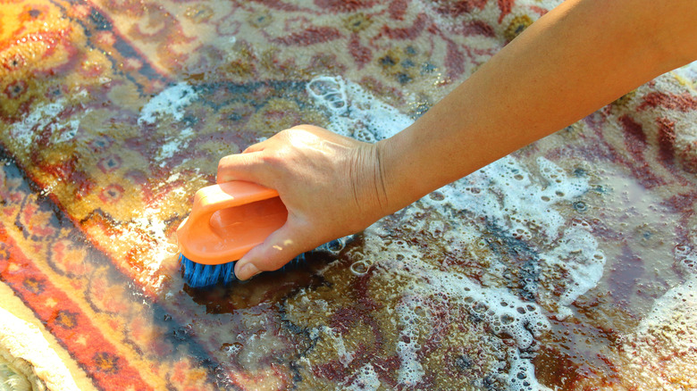 Hand scrubbing outdoor rug