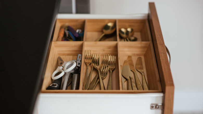 Wooden silverware tray in drawer