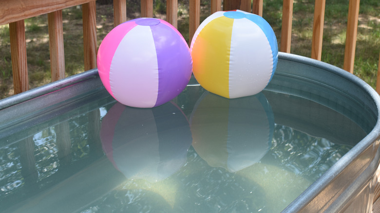 Floating balls, stock tank pool