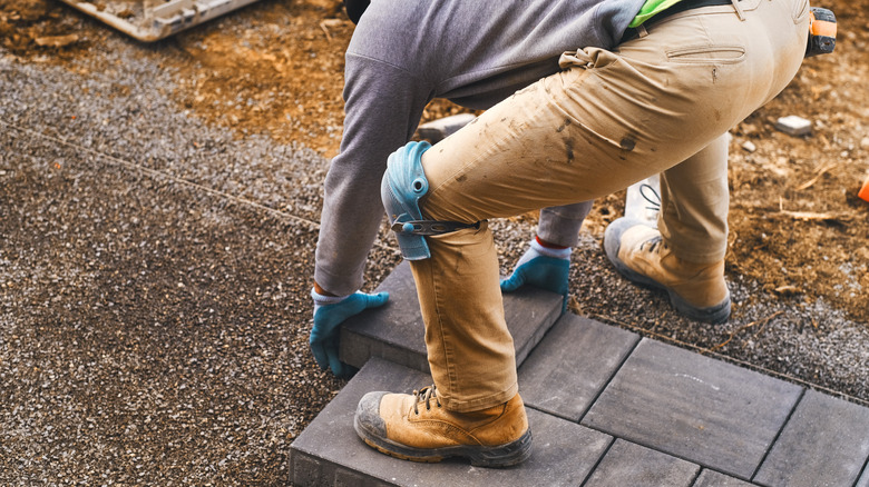 landscaping professional working on patio