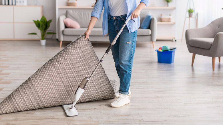 Mopping under a rug