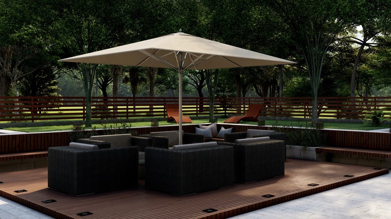 Furniture under square patio umbrella 