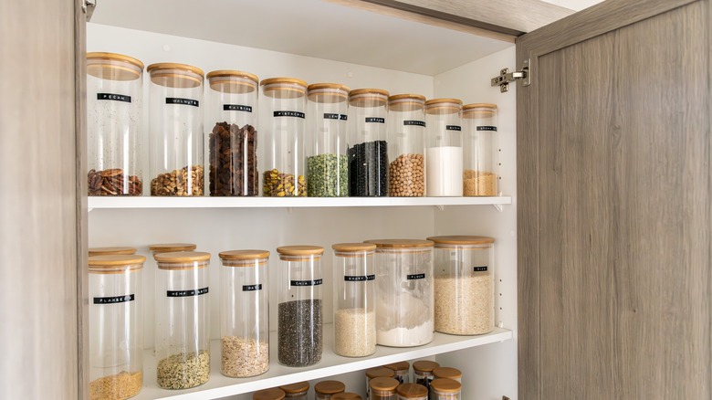 organized pantry with labeled bottles