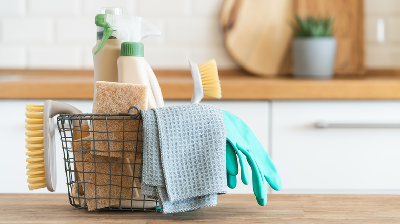 Cleaning supplies in wire basket