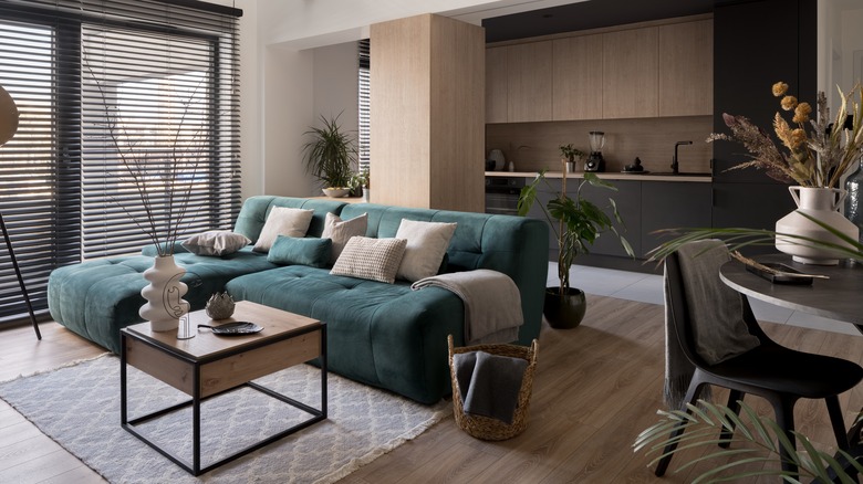 sectional teal sofa in open living room