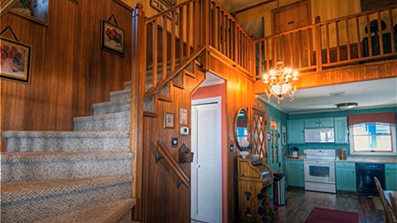 Interior of Inn w/ kitchen and staircase