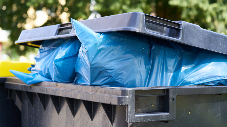 overfilled trash can