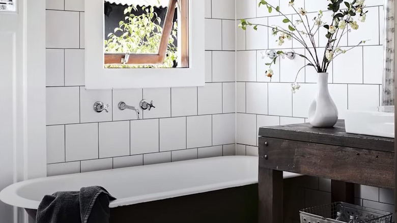 tub with wall-mounted taps