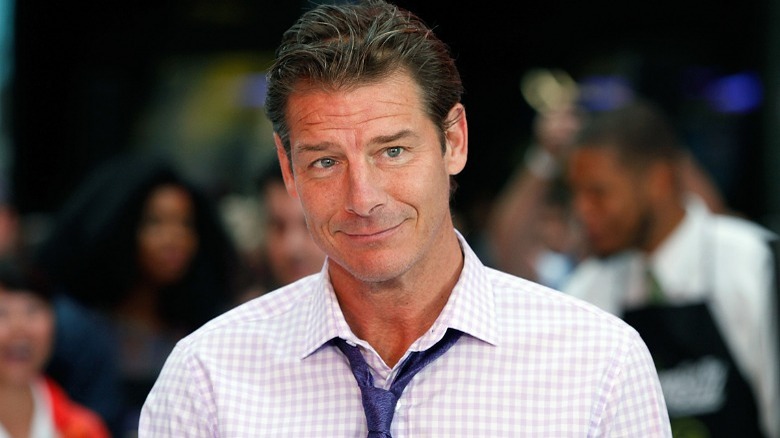 Ty Pennington loosened tie smiling 