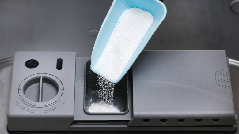 Detergent poured into dishwasher