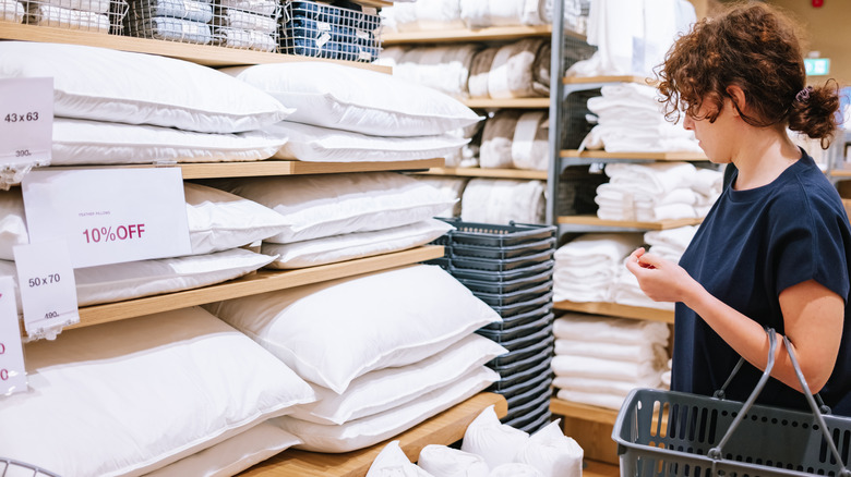 woman buying bedding