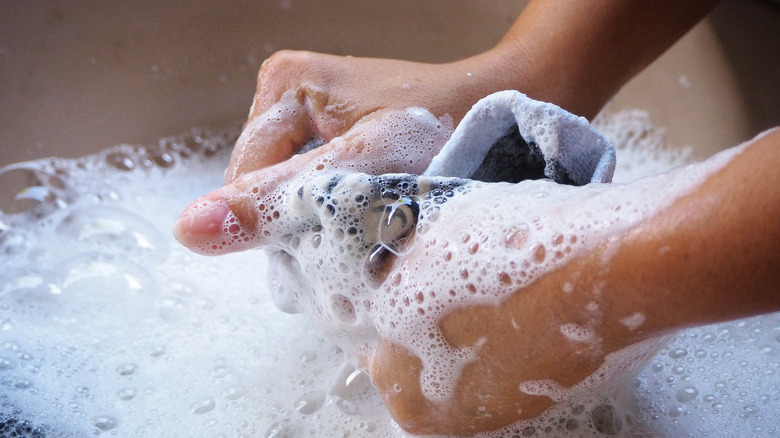 Person handwashing shirt