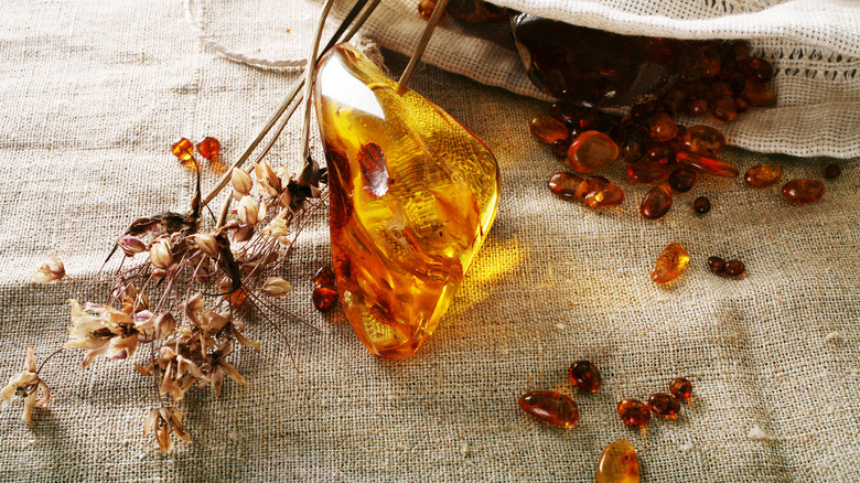 amber stones and dried flowers