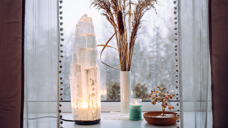 Selenite lamp on windowsill