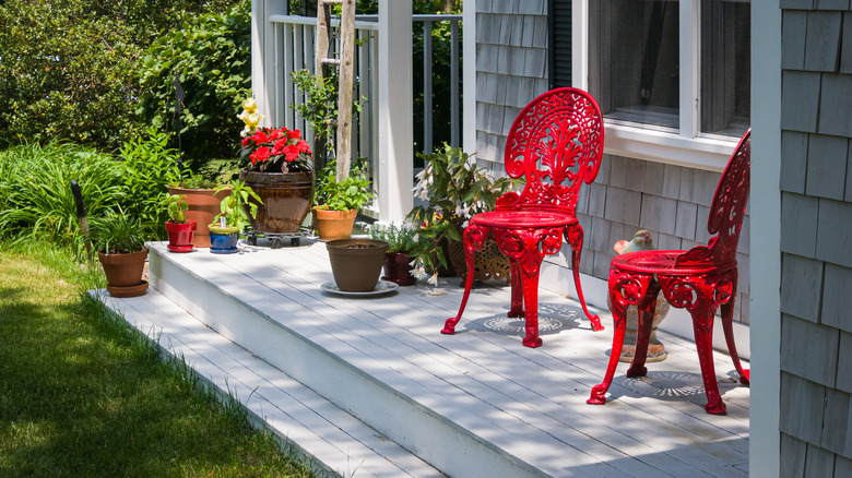 Red chairs on porch