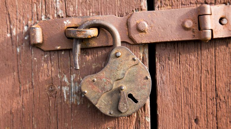 broken padlock on old door