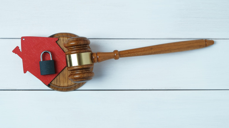 gavel with house and padlock