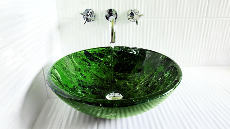 Green vessel sink white countertops