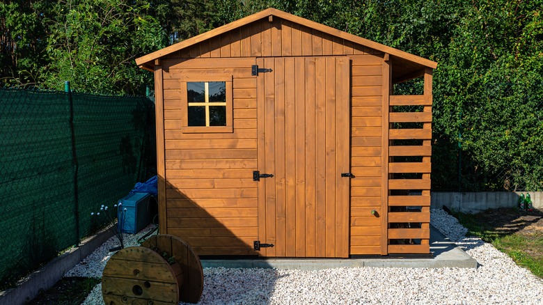 Clean wooden shed in yard