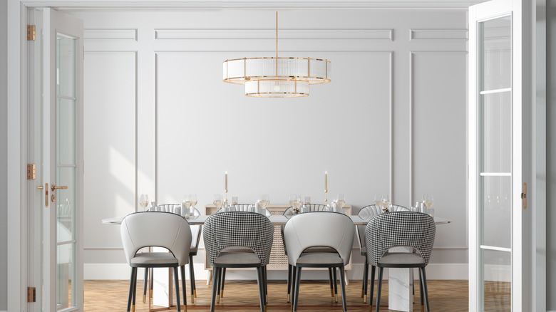 chandelier in gray dining room