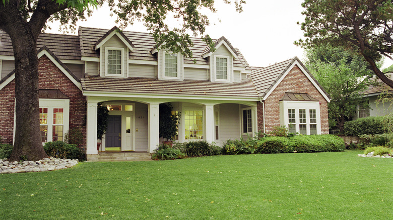 House with healthy lawn