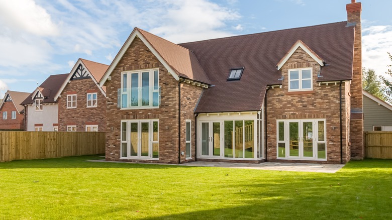 house with lush lawn