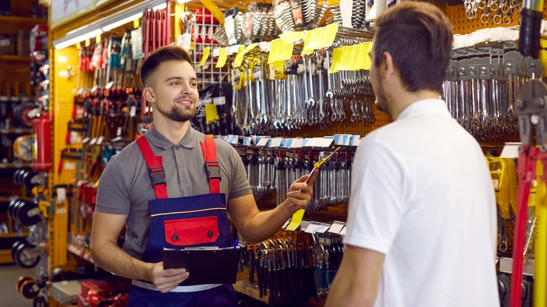 employee and customer in store