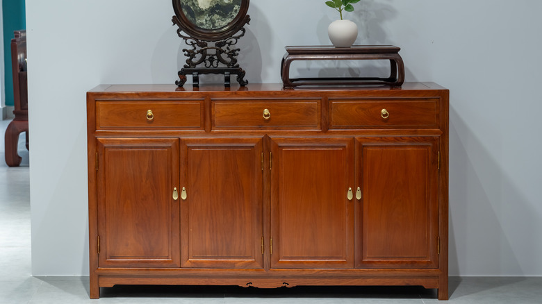 Wood console cabinet in home