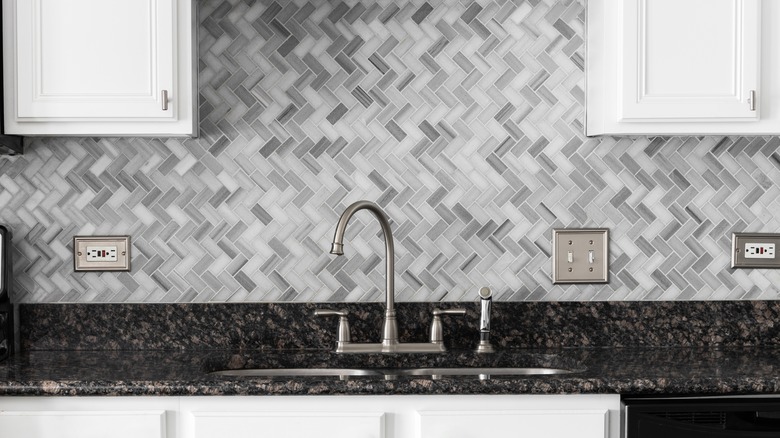 vertical herringbone backsplash