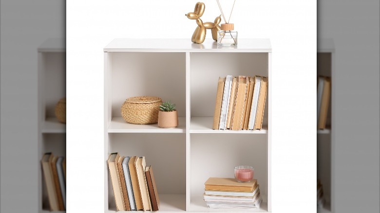 small white styled shelving unit