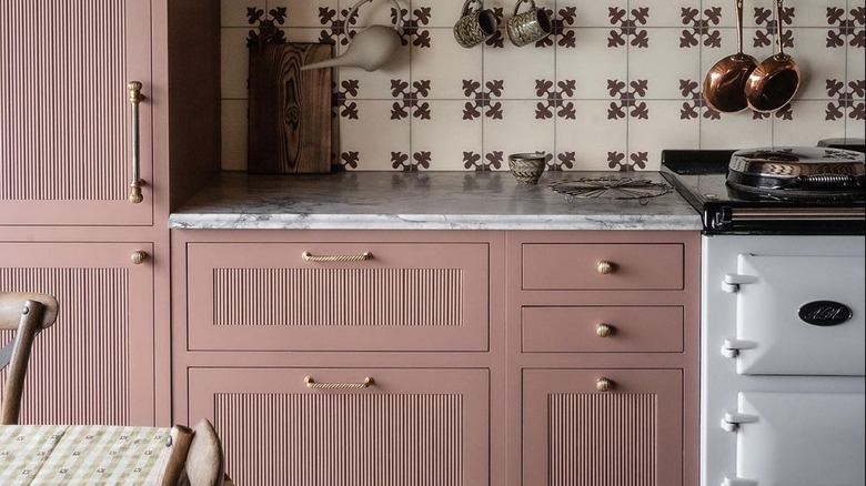 Soft pink kitchen cabinets