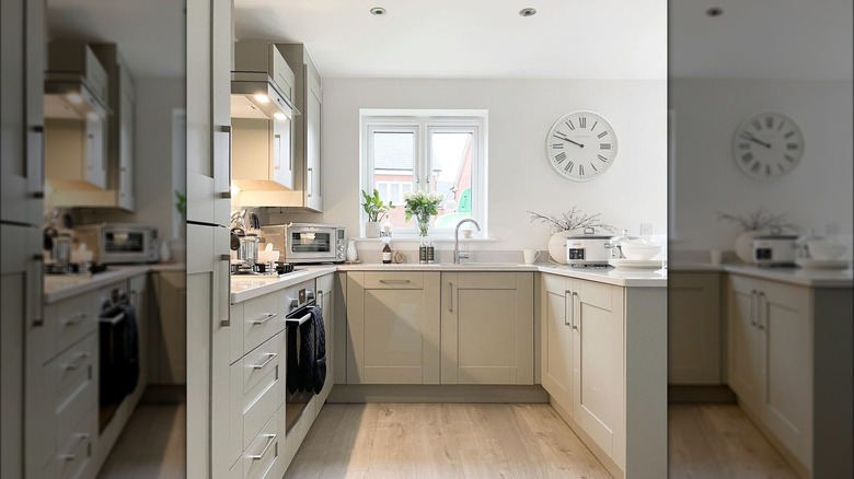 Modern kitchen with tan cabinets