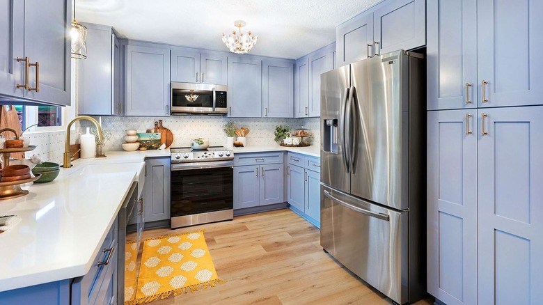 Kitchen with denim blue cabinets