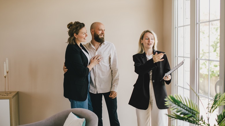 Real estate agent and couple