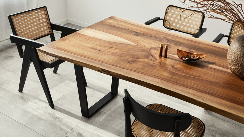 wooden dining table with chairs