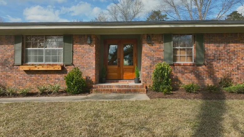 A red brick house updated by Erin Napier