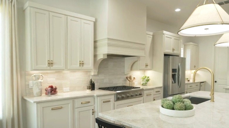 A white and modern kitchen interior