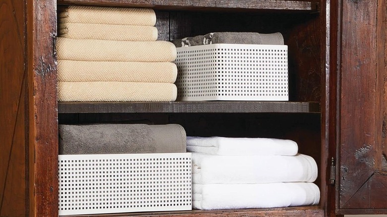 Nate Berkus bins storing towels