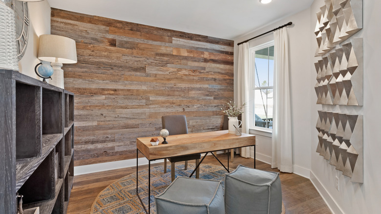 Reclaimed wooden wall with a wooden door