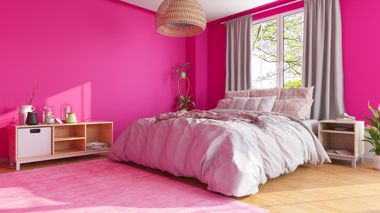 bedroom with pink wall paint