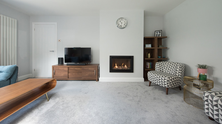 living room with gray carpet