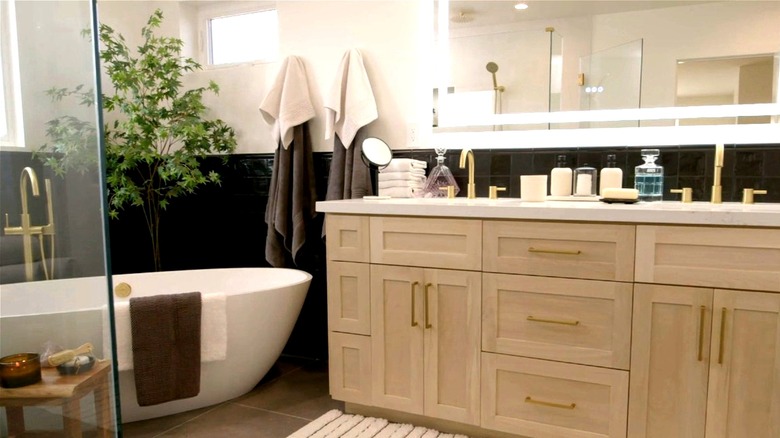 bathroom with gold fixtures