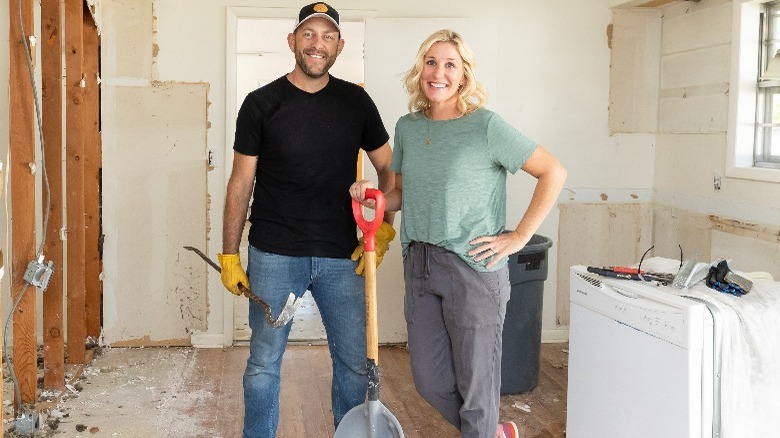 Dave and Jenny Marrs holding tools